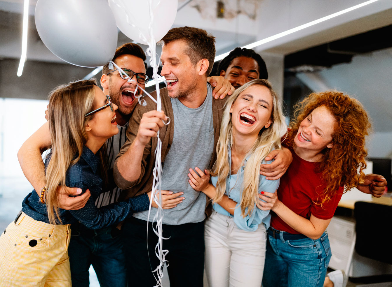 happy-business-people-celebrating-success-at-compa-K6SJ6C8.jpg